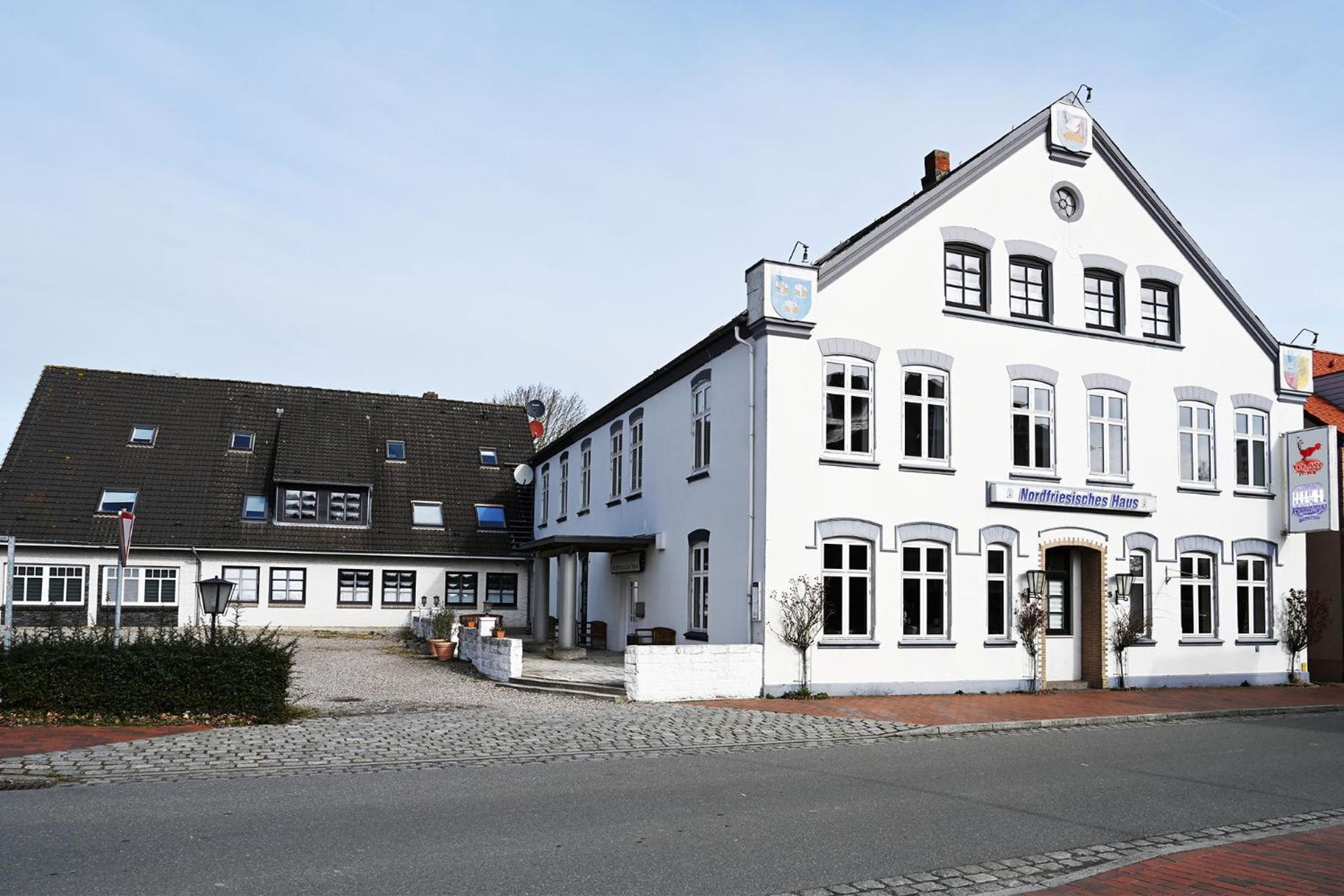 Nordfriesisches Haus Hotel Toenning Exterior photo